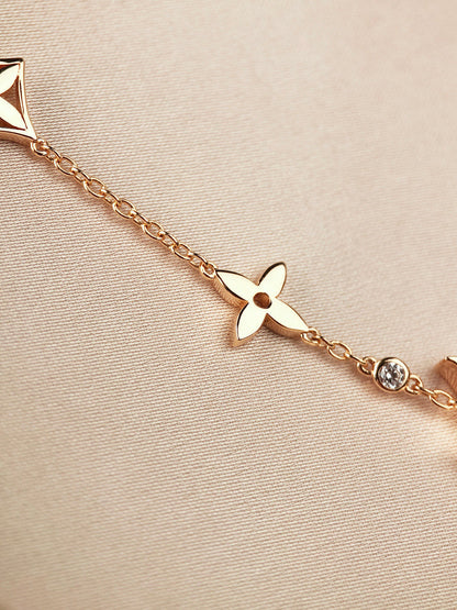 ¡®Glow Jewelry¡¯STAR AND SUN 7 MOTIFS GOLD BRACELET