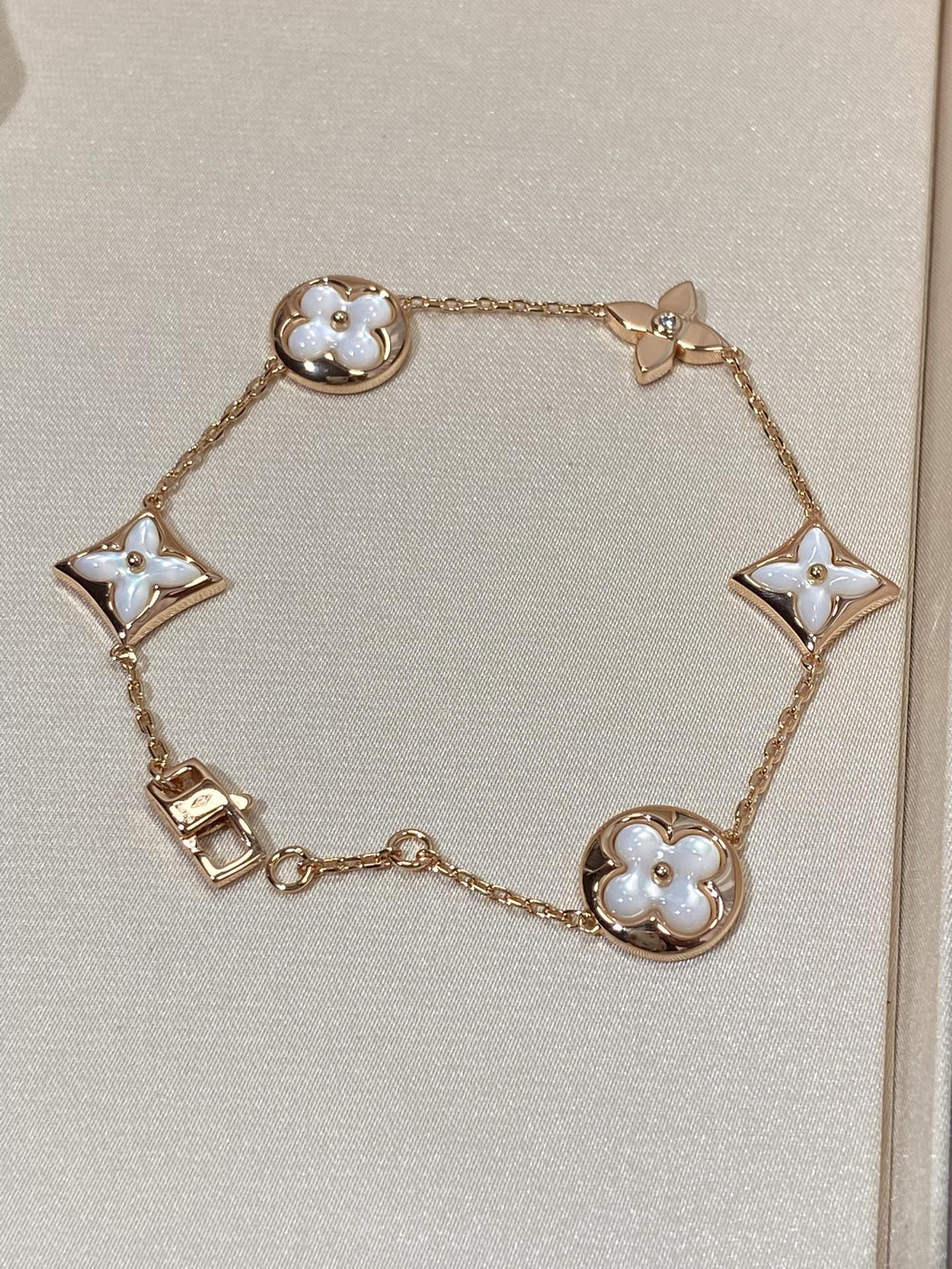 [Glow Jewelry]STAR AND SUN 5 MOTIF MOP PINK GOLD BRACELET