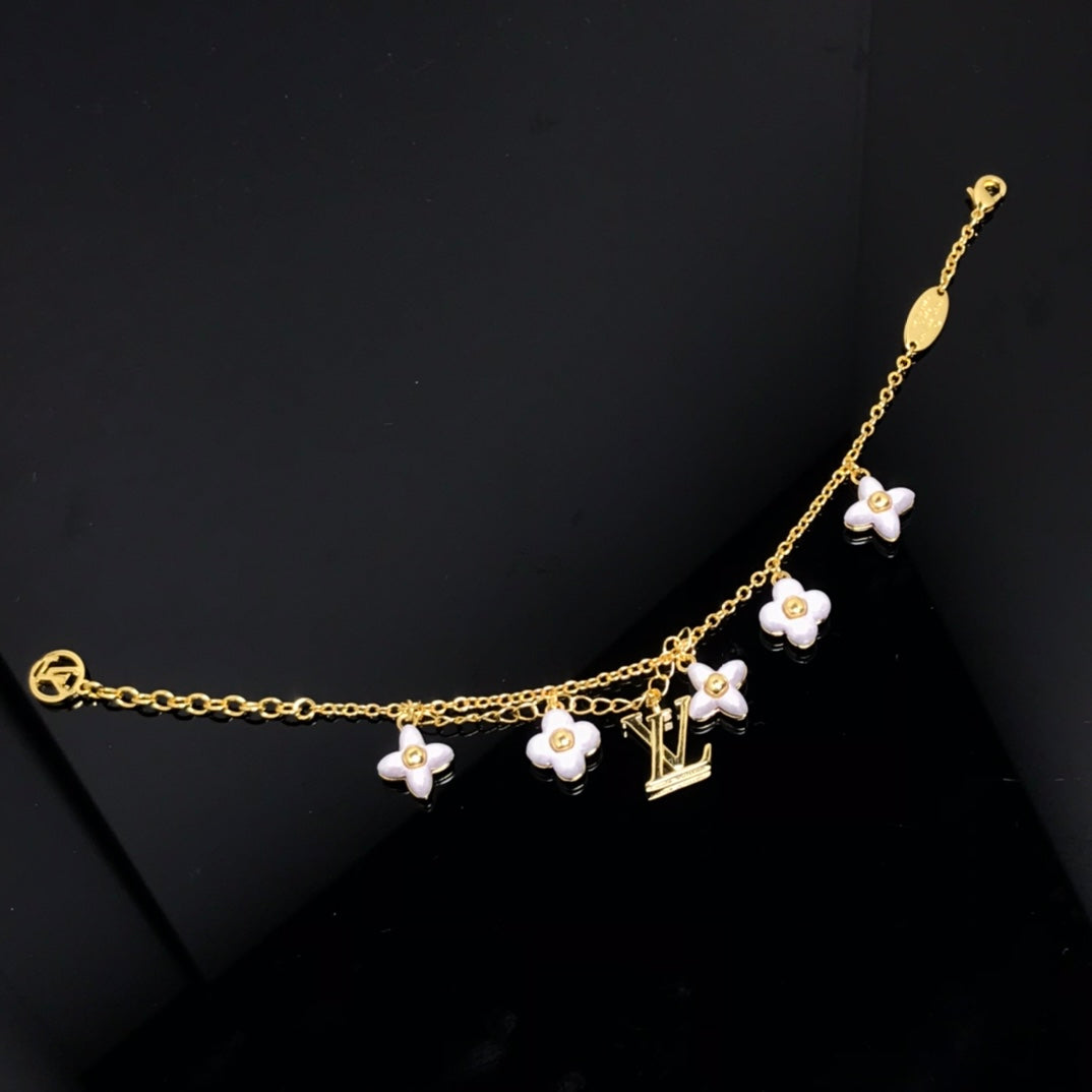 [Glow Jewelry]LOGO 6 MOTIF STAR AND SUN GOLD BRACELET
