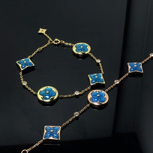 ¡®Glow Jewelry¡¯STAR AND SUN 4 MOTIF BLUE BRACELET